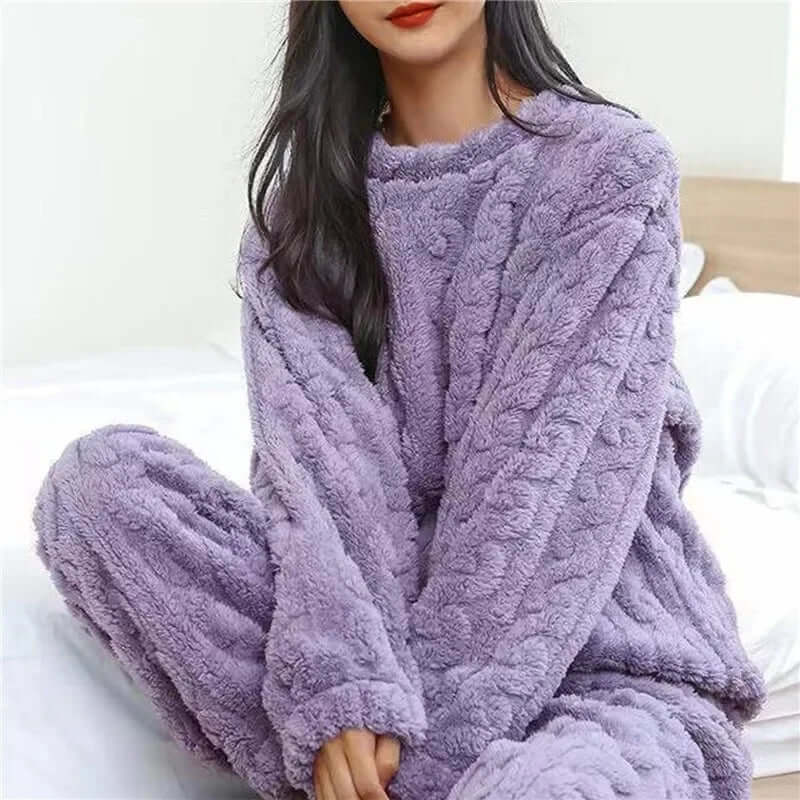 Elegant women's fleece pajama set. Plush, warm, and comfortable for relaxation and sleepwear.