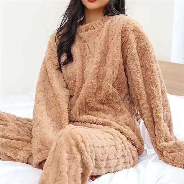 Plush fleece two-piece pajama set for women. Ultimate comfort and softness for sleep and lounging.