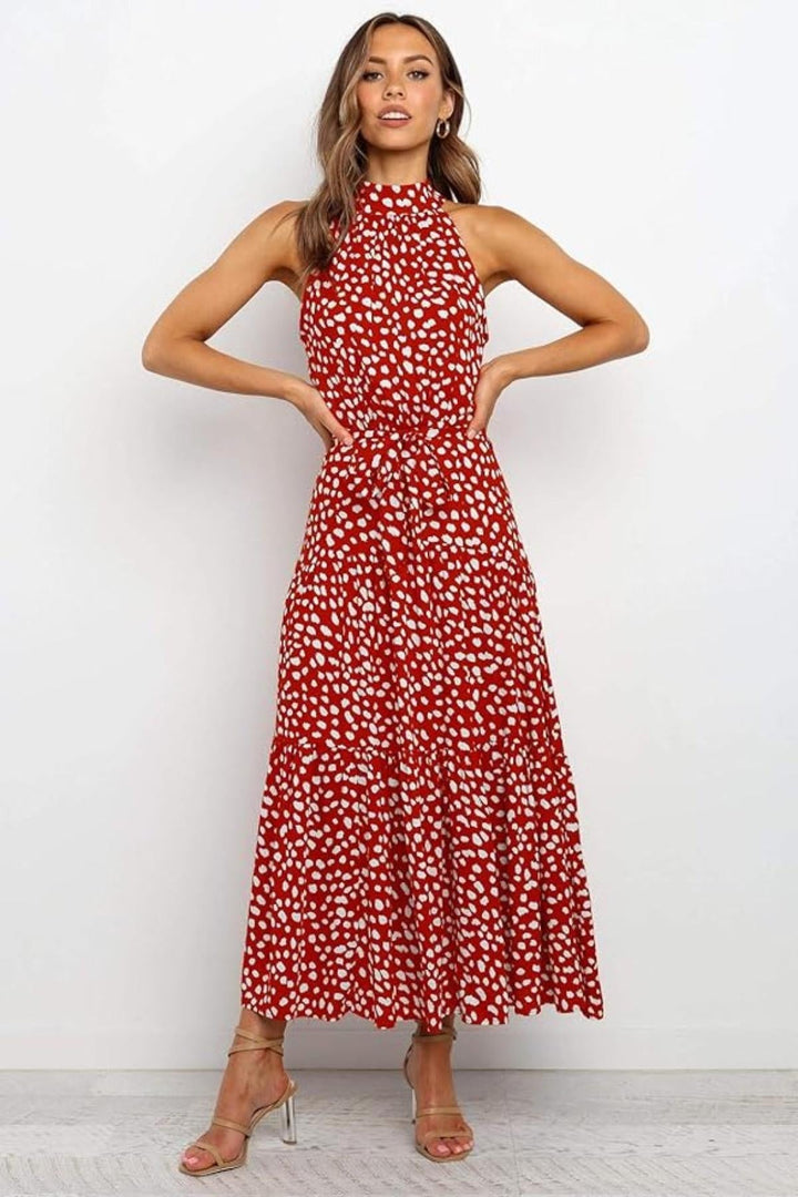 Classic polka dot halter neck midi dress, ideal for elegant casual summer outfits for women.