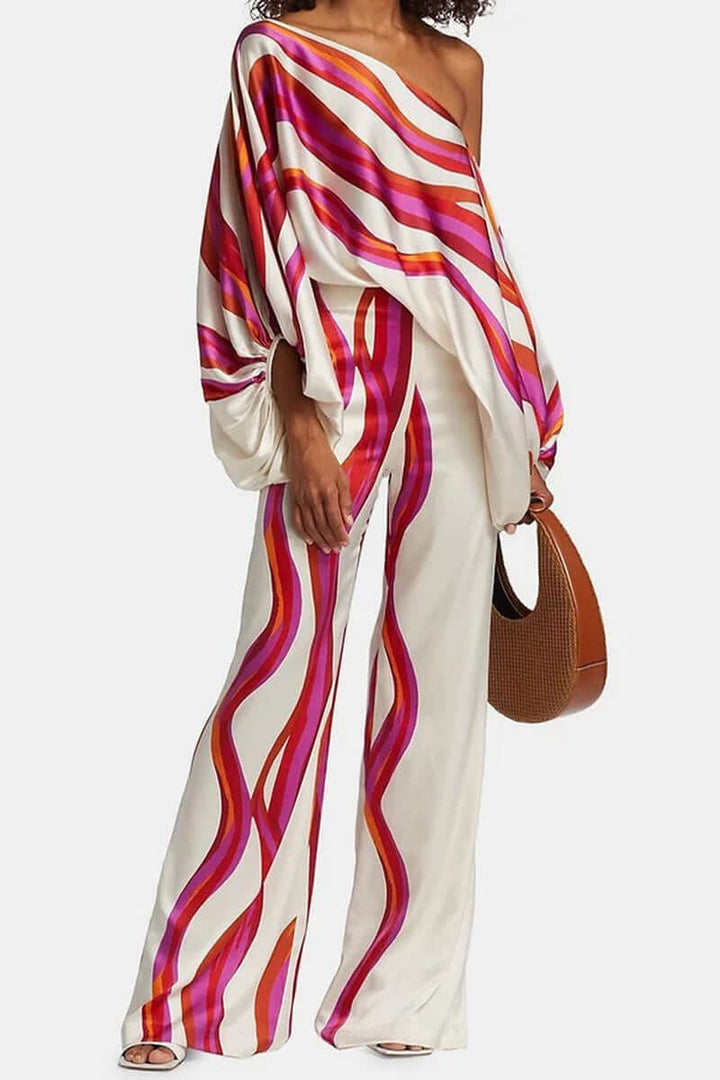 Casual chic women's printed two-piece set: off-shoulder top & high-waist skirt.