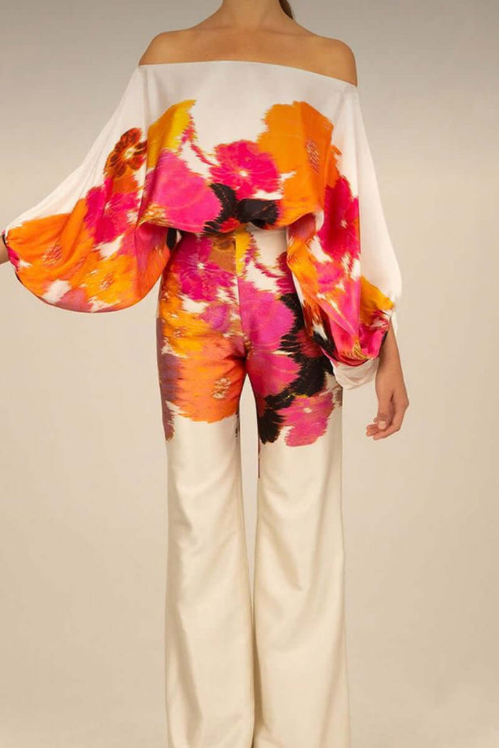 Coordinated women's printed off-shoulder long sleeve outfit, perfect for parties.