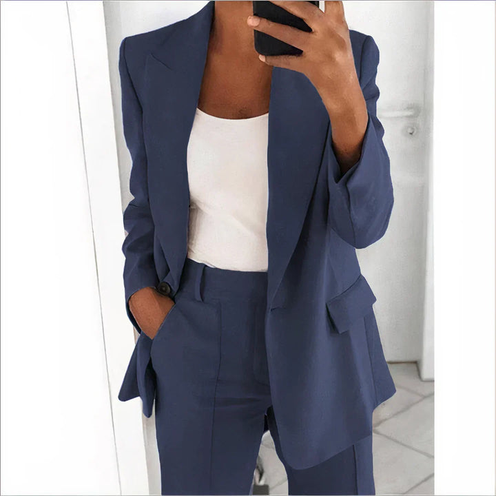 Stylish women's tailored blazer & high-waisted pants matching set. A modern professional pantsuit for elegance.