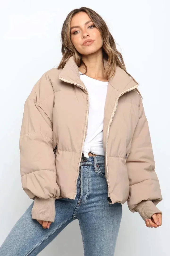 Stylish women's quilted puffer jacket, ideal outerwear for casual winter fashion and everyday warmth.
