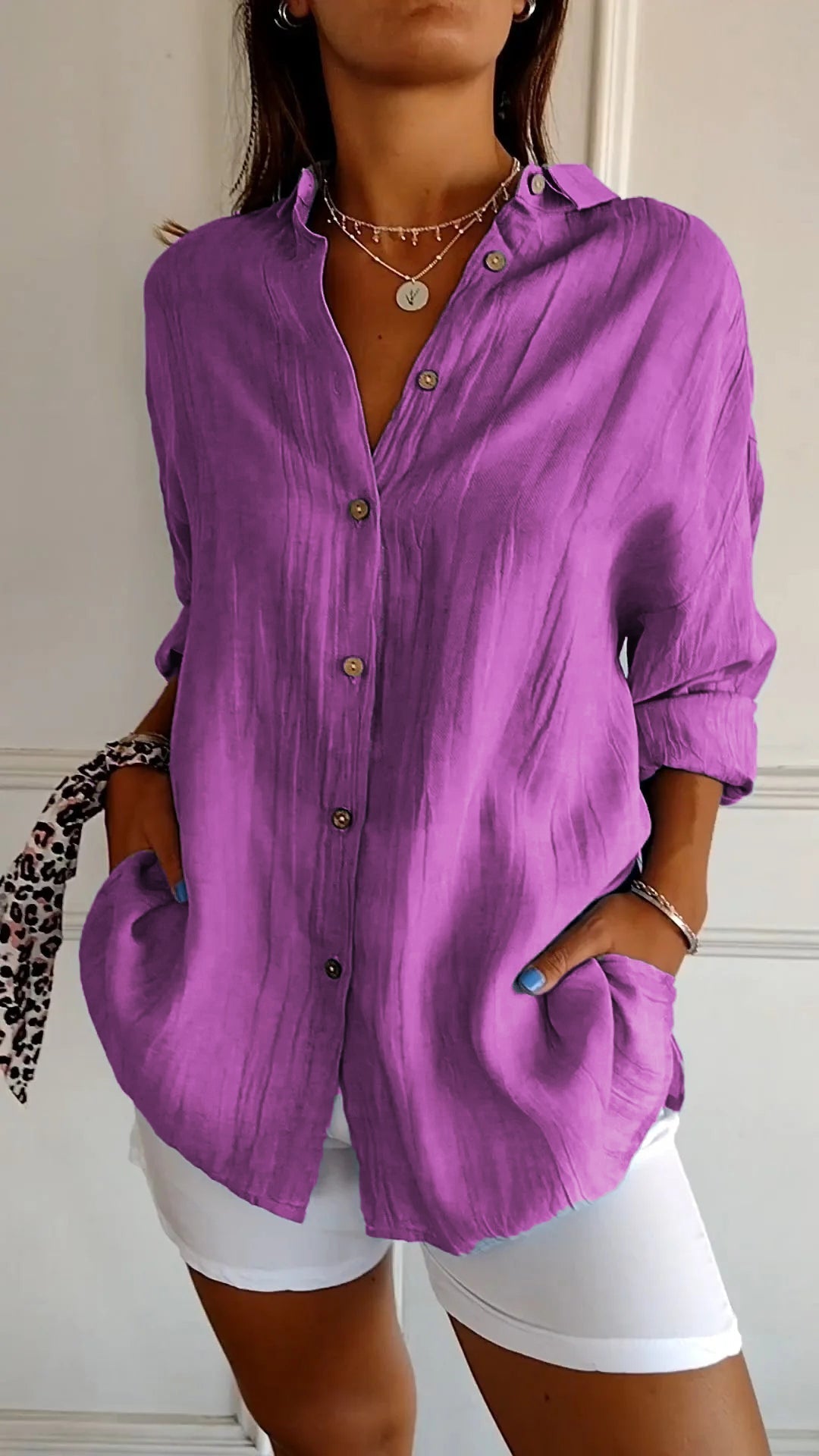 Women's button-up long sleeve shirt, relaxed fit, a versatile and chic casual top for multiple occasions.