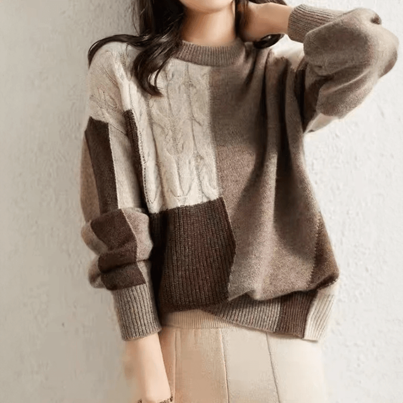 Stylish women's hip-length relaxed fit sweater. Ideal long-sleeve pullover for effortless fall & spring fashion.