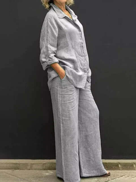 Women's relaxed shirt and wide-leg trousers set. Linen blend, breathable two-piece for a chic casual outfit.