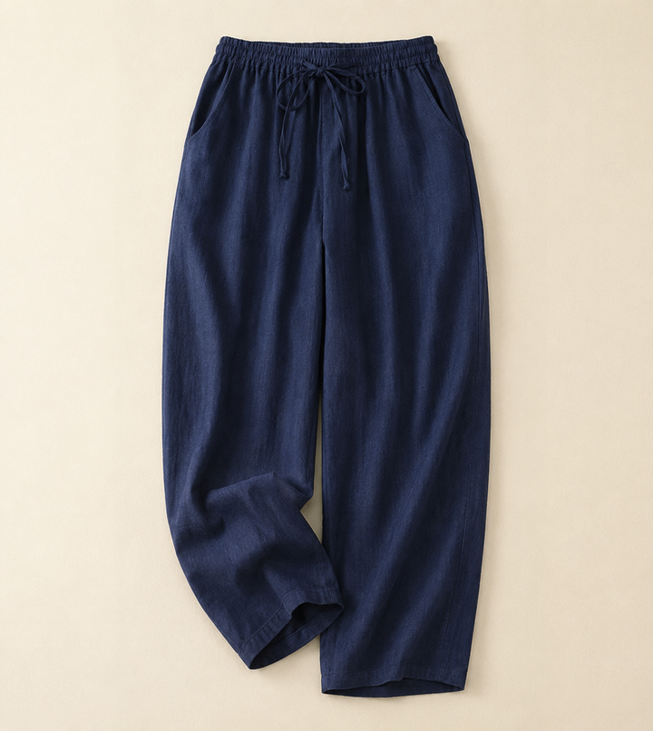 Woman wearing relaxed fit summer pants, perfect for effortless comfort & chic style on a warm day or vacation.