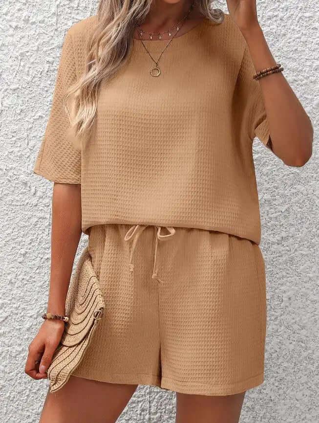 Cozy women's matching two-piece polyester lounge set, perfect for relaxed casual wear and everyday comfort.