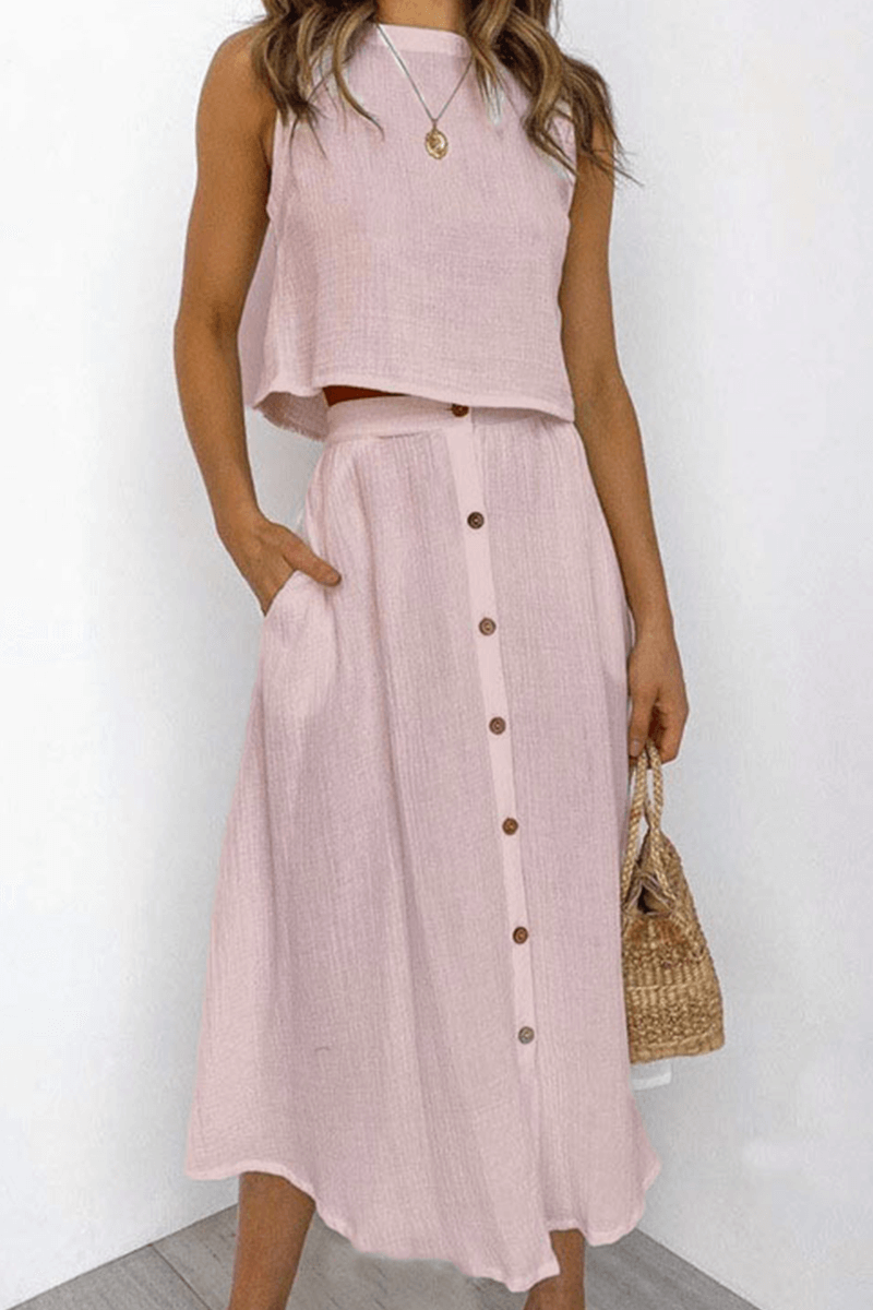 Elegant women's spring/summer set: comfortable relaxed top with round neck & stylish midi skirt outfit.