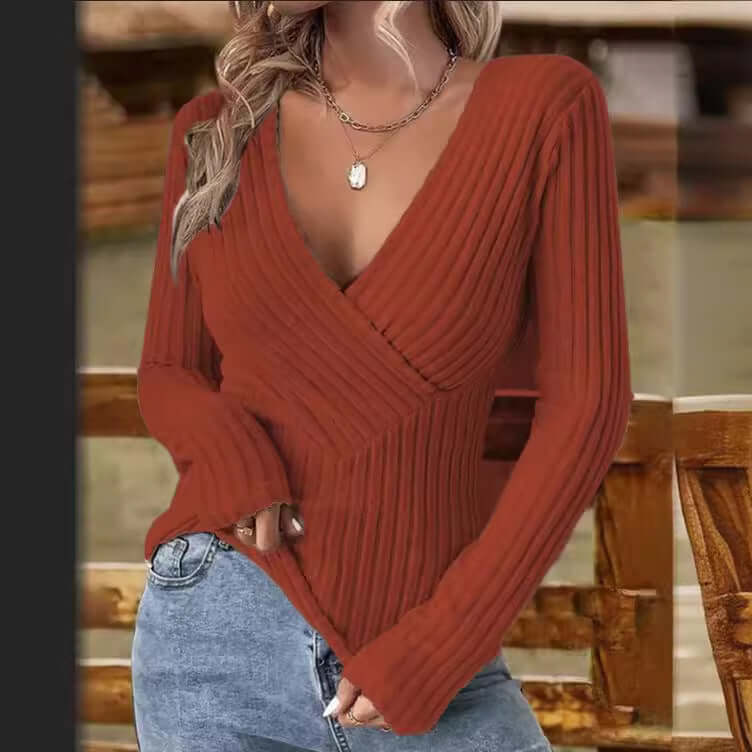Soft ribbed knit women's sweater with a stylish wrap V-neck and long sleeves, versatile top.