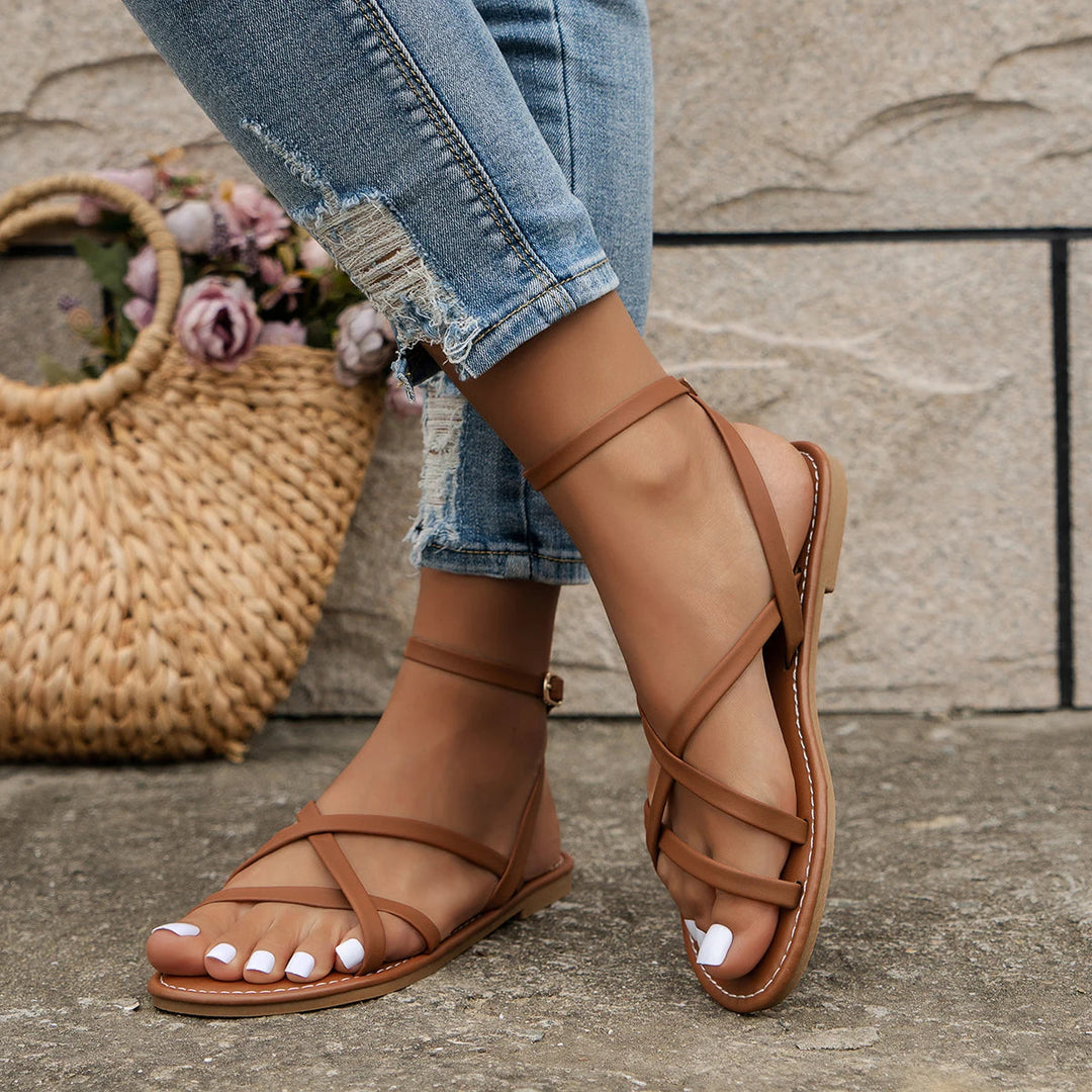Comfortable women's Roman-style sandals with multiple straps and a functional back zipper, great for summer.