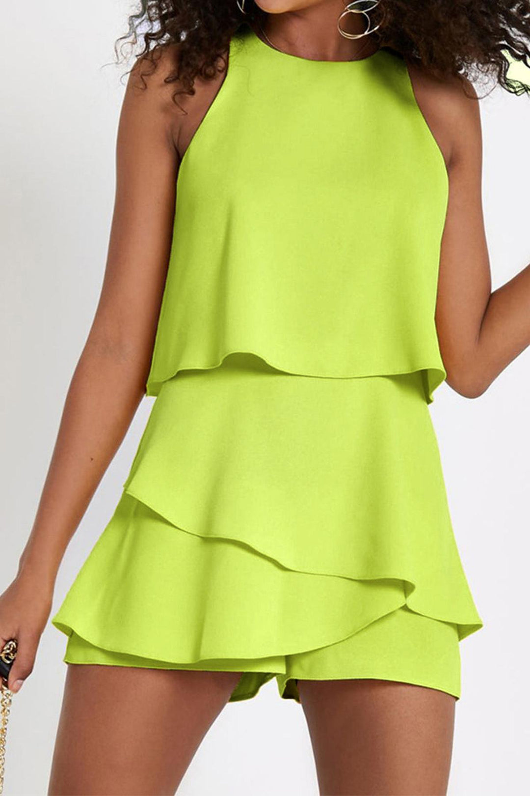 Fashionable women's casual one-piece romper with ruffles, a perfect sleeveless option for summer days.