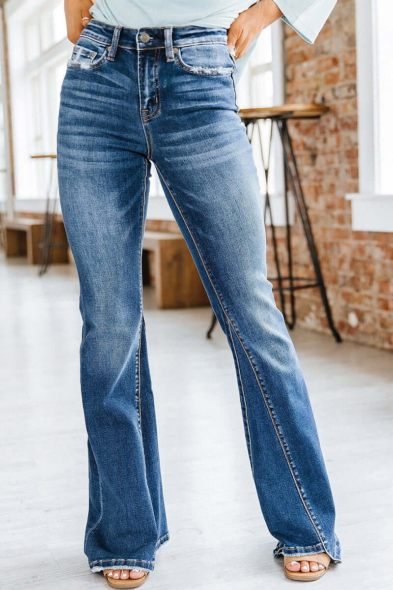 Women's slim fit high-waist flared jeans in retro blue denim, perfect for a versatile fashion statement.