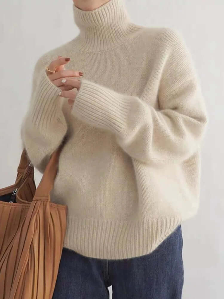 Women's soft knitted high neck pullover sweater in a warm winter shade, perfect for cozy and elegant casual wear.