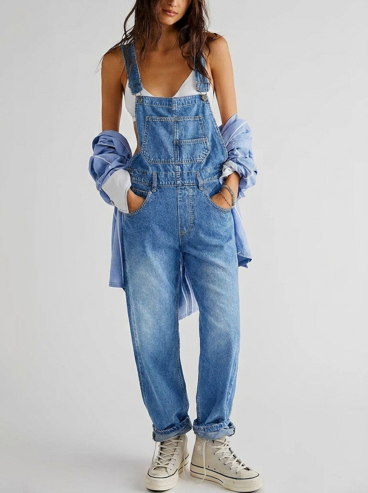 Women's straight leg jumpsuit in denim blue, featuring a sleeveless, casual fit for effortless everyday style.