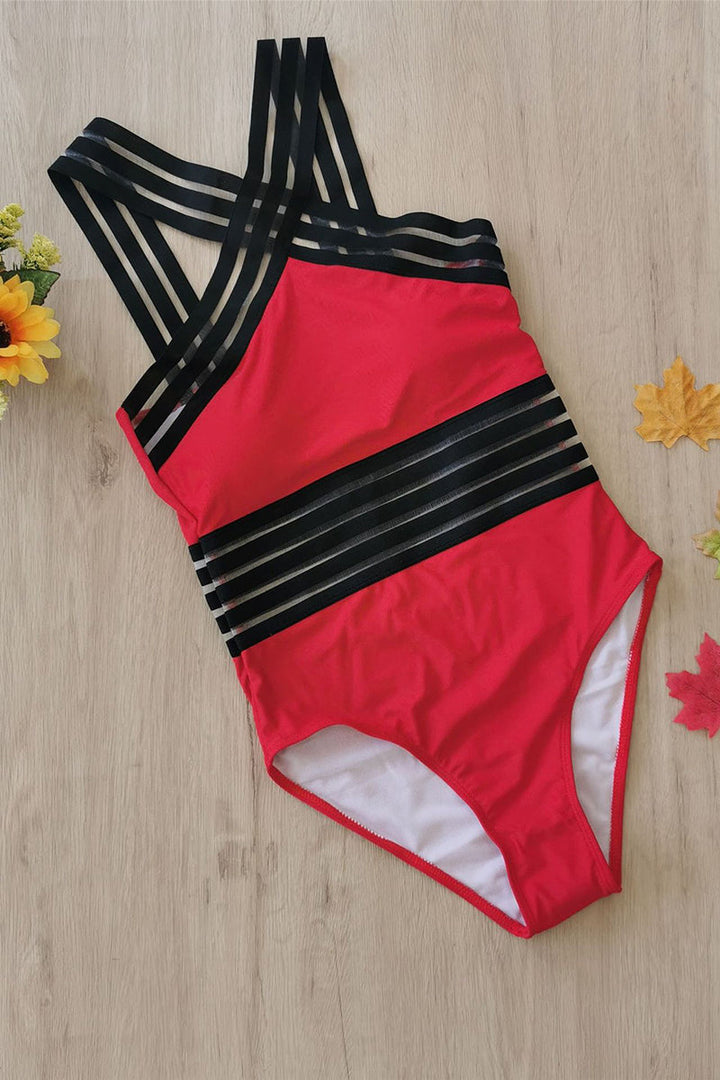 Dynamic strappy monokini for women, a comfortable and stylish one-piece perfect for your next vacation.
