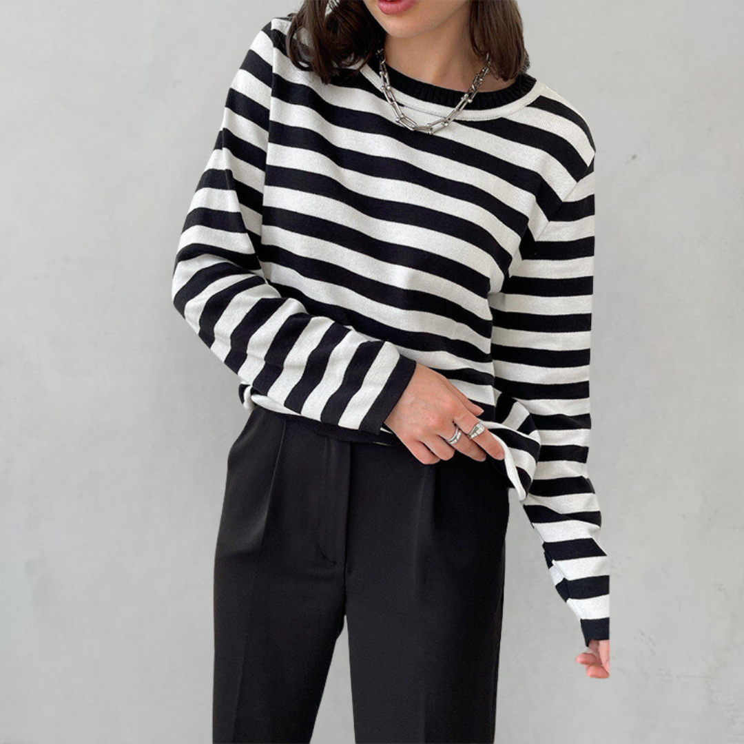 Versatile women's long sleeve crew neck striped knit sweater. Ideal casual pullover for autumn fashion.