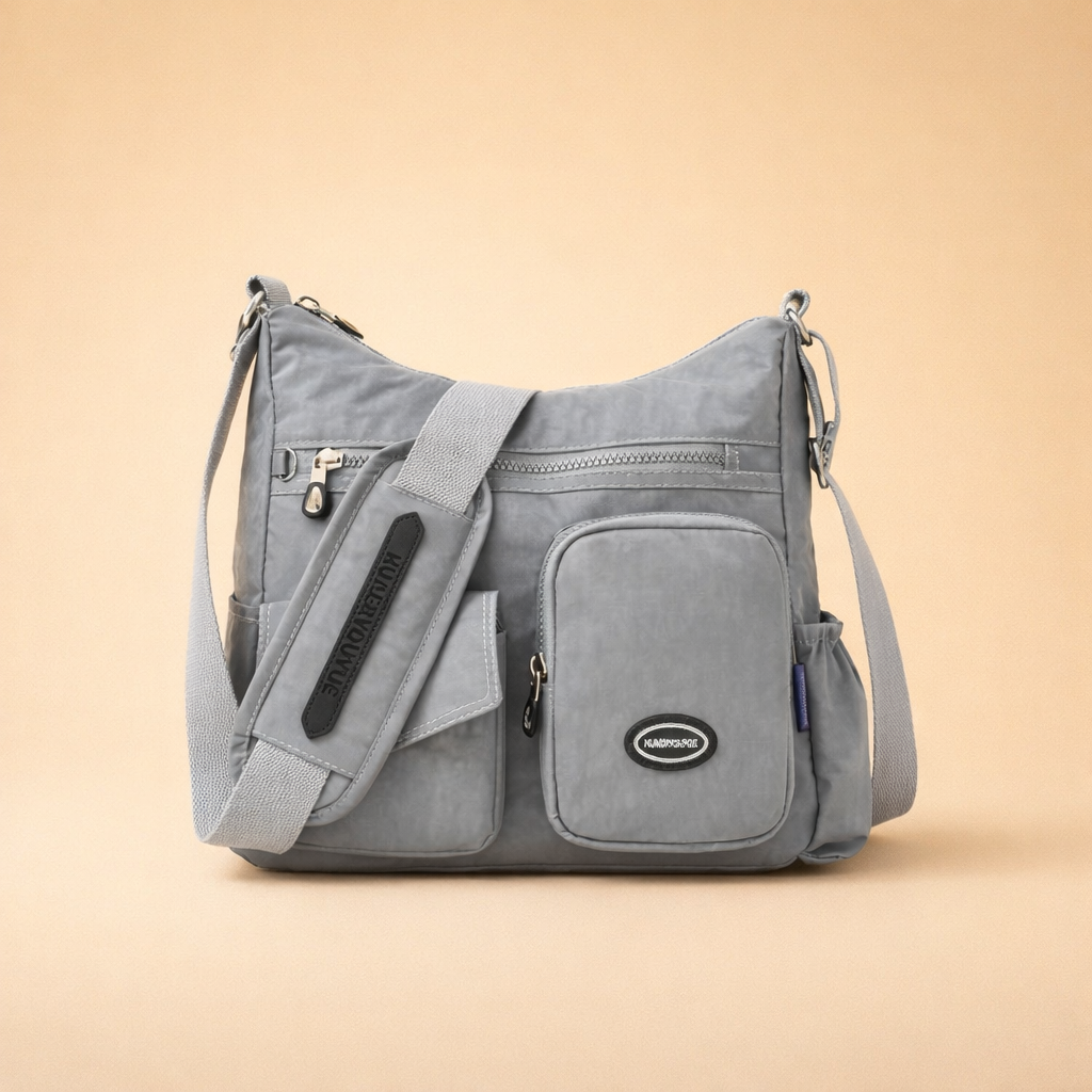 Lightweight nylon crossbody bag for women, featuring anti-theft design & multiple pockets.
