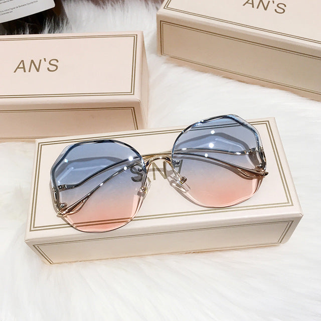 Women's stylish boho ombre sunglasses with gradient lenses & gold temples, offering UV protection for summer fashion.