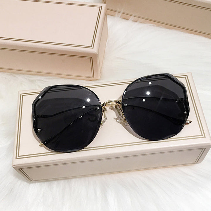 Stylish women's boho ombre sunglasses featuring gradient lenses, gold temples, & essential UV protection.