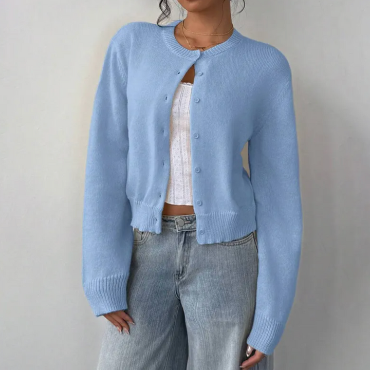 Ladies' elegant cropped cardigan sweater with delicate ribbed cuffs & hem.
