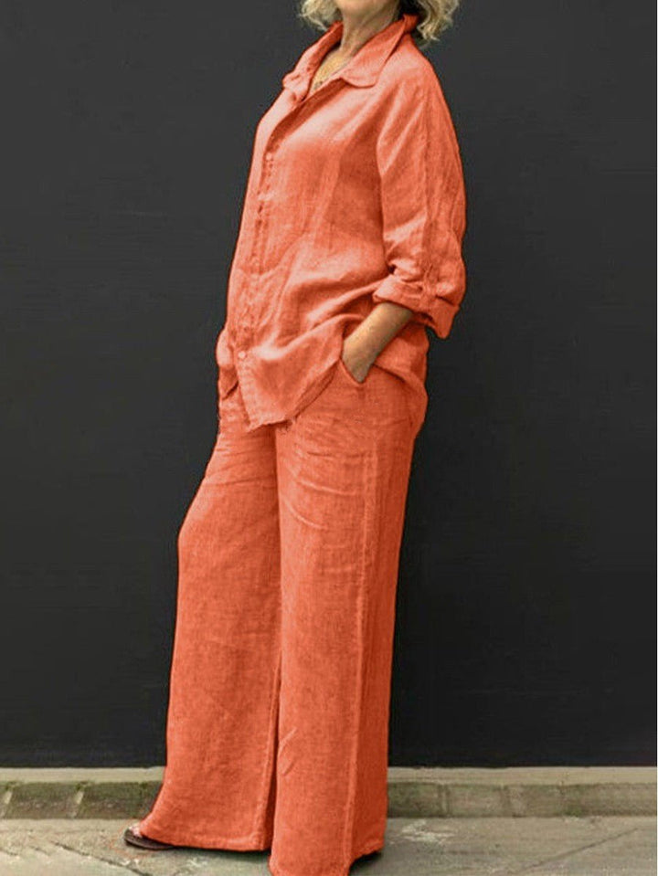 Effortless chic women's summer two-piece set. Relaxed V-neck top & elastic waist pants for versatile wear.