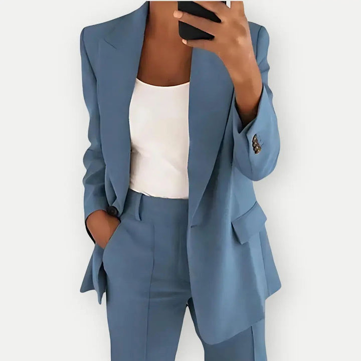Women's elegant tailored blazer & trouser set, perfect for professional business fashion.