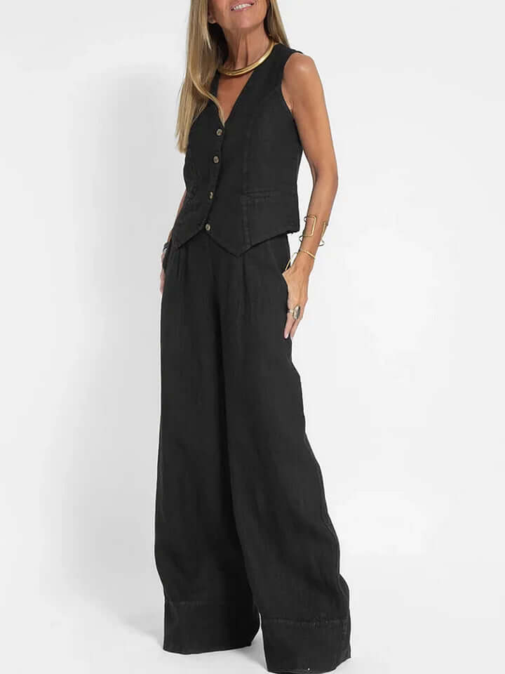 Tailored black linen two-piece set for women, featuring a stylish vest & matching pants.