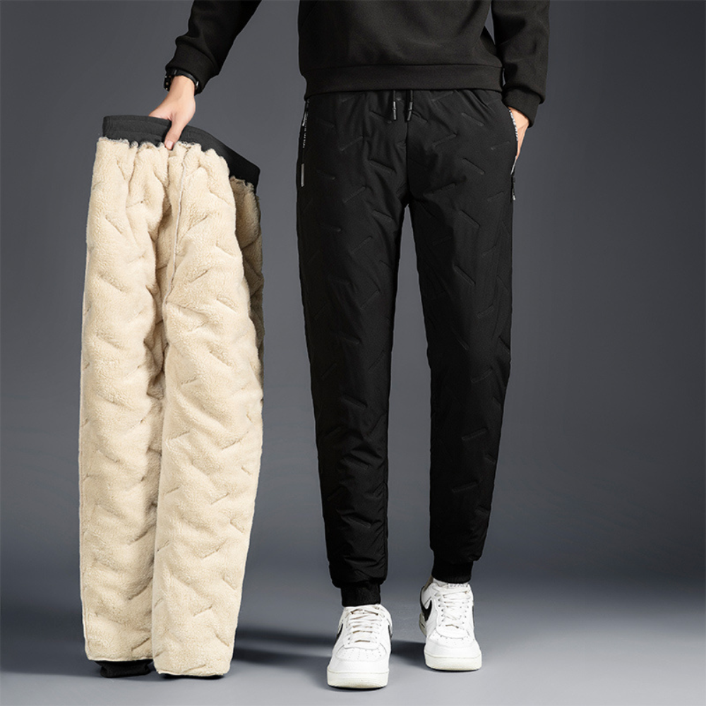 Women's fleece-lined thermal waterproof pants, great for hiking, snow activities, and general cold weather outdoor wear.