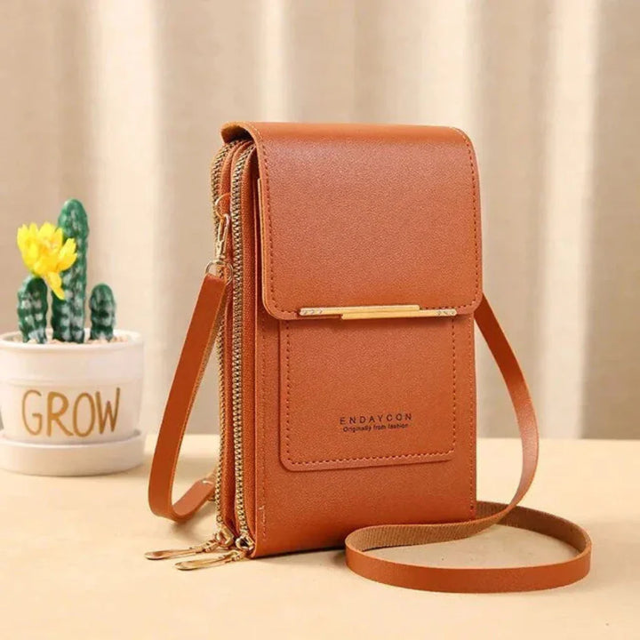 Elegant women's crossbody phone purse with touch screen. Practical daily essential handbag.