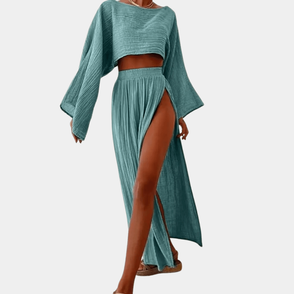 Women's summer fashion two-piece set: trendy crop top & flowy high-slit maxi skirt. Perfect for vacation outfits.