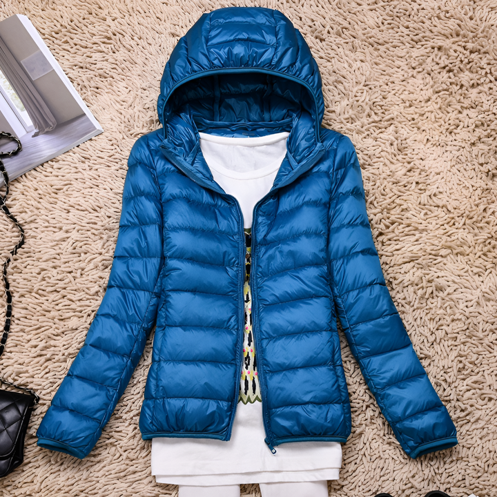Stylish women's lightweight hooded coat. All-season packable outerwear, perfect for travel & everyday comfort.