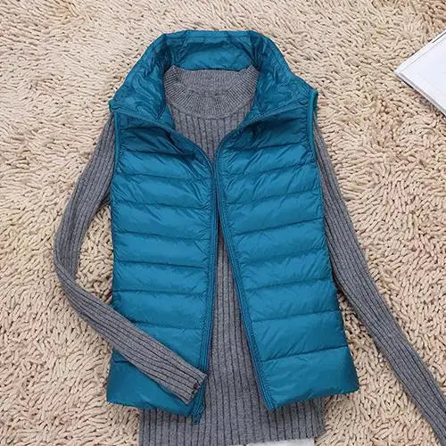 Lightweight women's puffer vest, soft & warm for fall and winter layering.