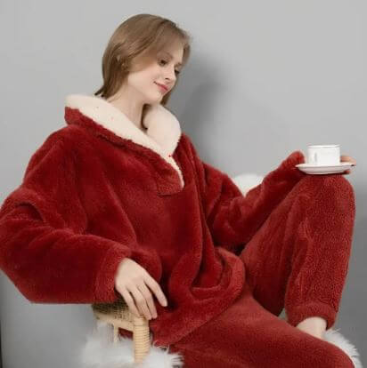 Stylish women's fleece pajama set, soft comfort & warm loungewear for cozy evenings and restful sleep.