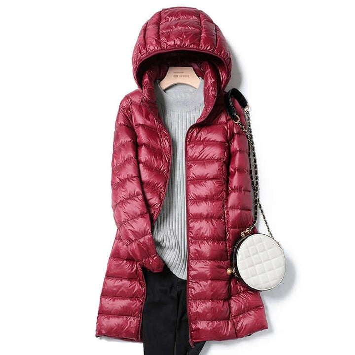 Modern women's ultralight winter puffer coat, offering warmth & style for casual outdoor adventures.