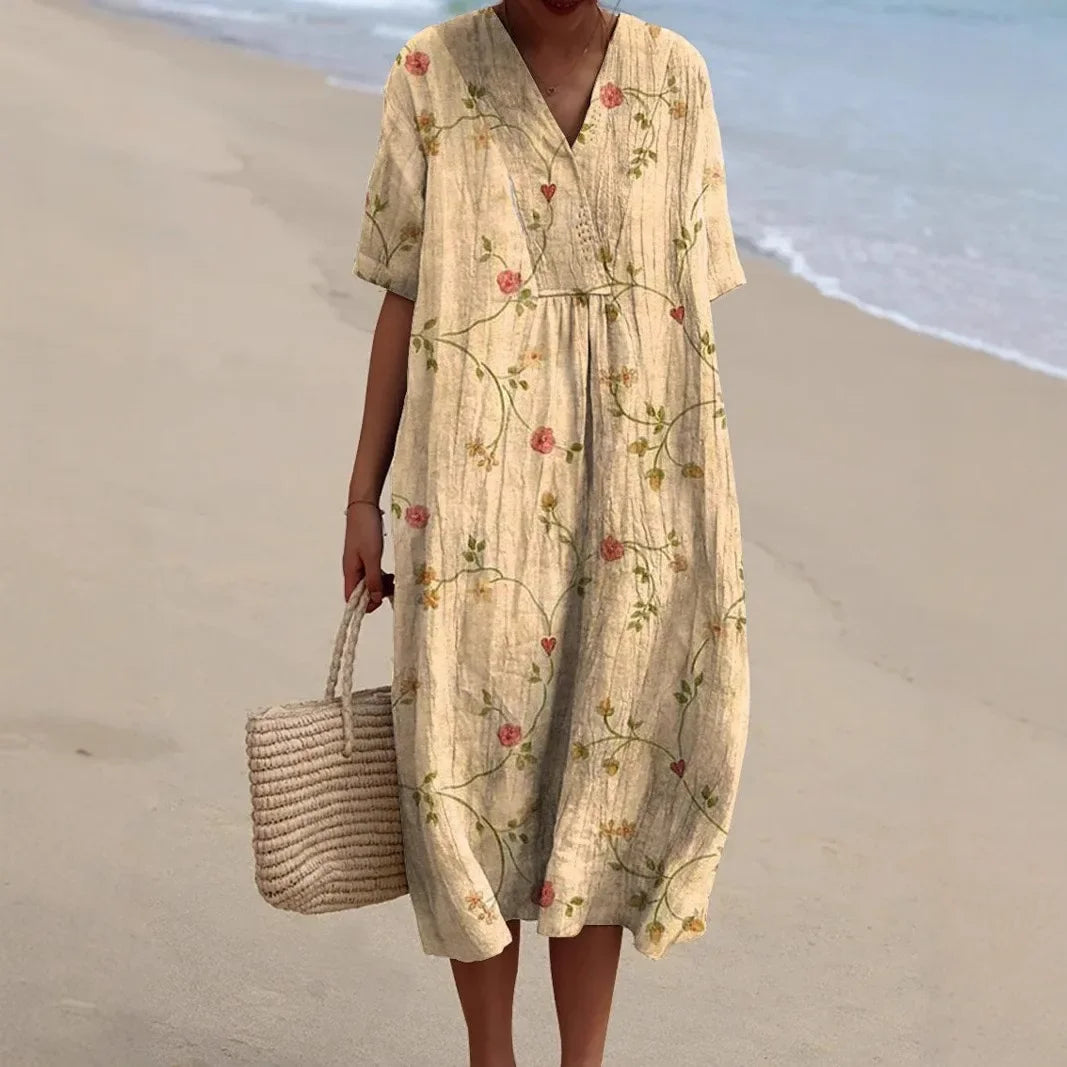 Elegant V-neck floral print midi dress for women. Ideal for summer beach trips & casual vacation style.