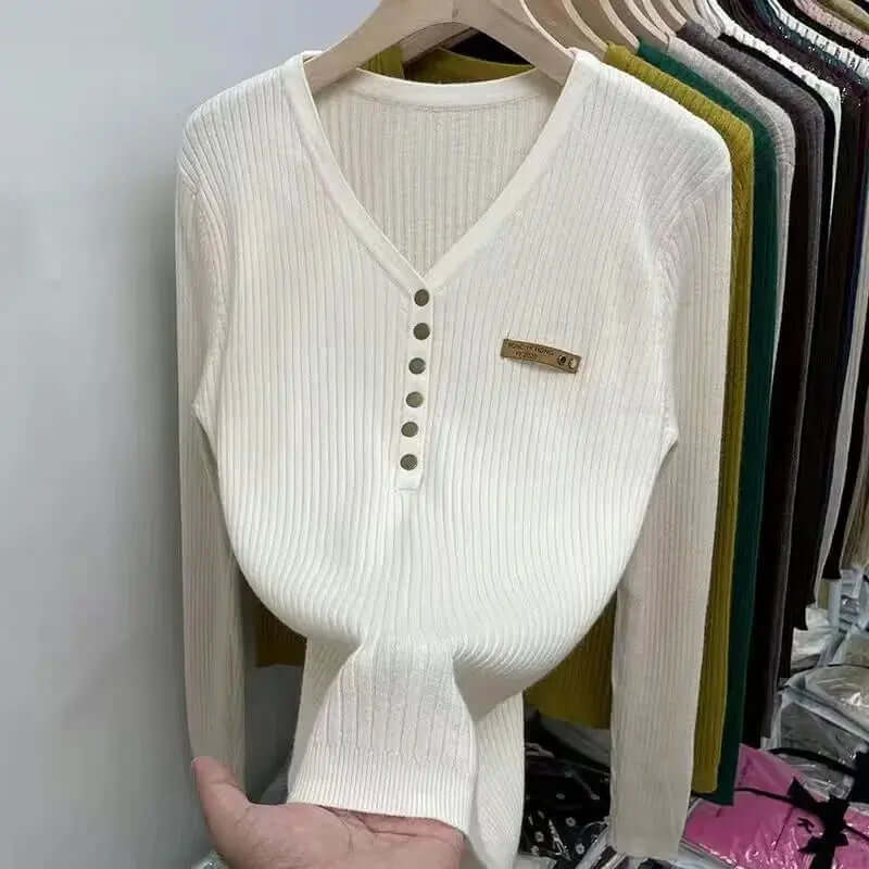 Cozy women's V-neck knitted sweater, ideal for comfort and style. Soft long-sleeve jumper for fall fashion.