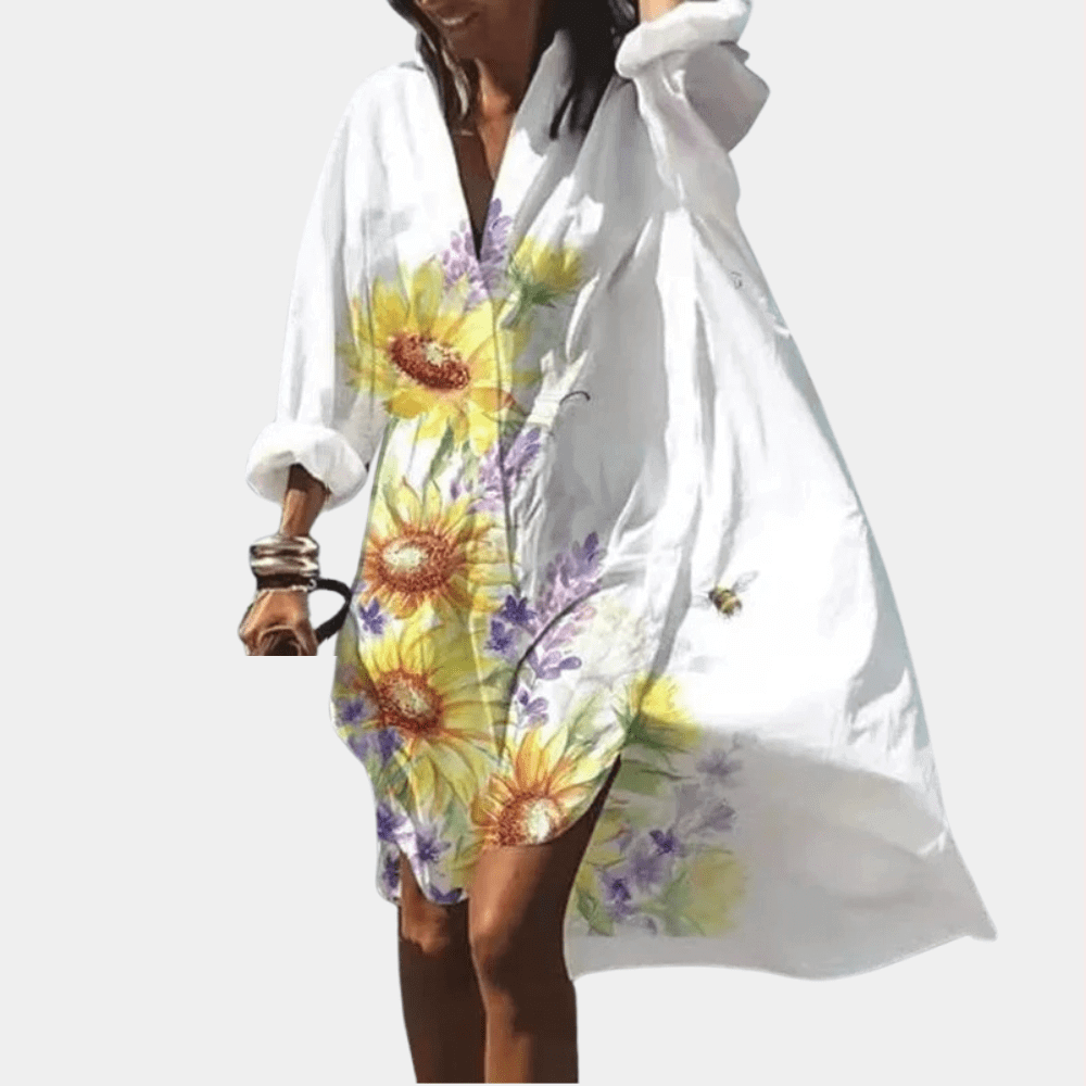 Comfortable women's flowy summer dress, vibrant polyester fabric, loose fit. Elegant casual beachwear.