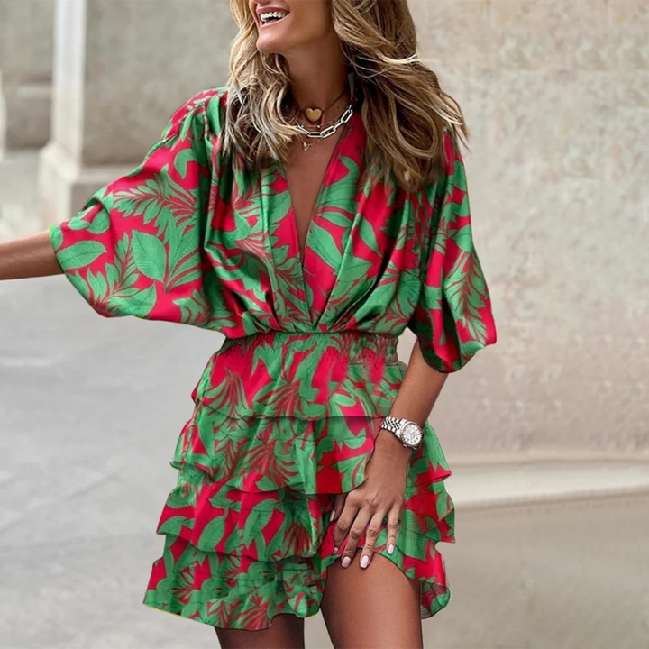 Flattering vibrant mini dress. Women's colorful sleeveless dress, ideal for summer parties or casual wear.
