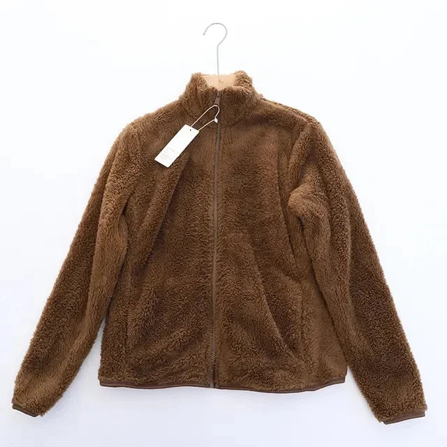 Everyday women's cozy fleece jacket, a soft and warm zip-up for casual winter fashion.