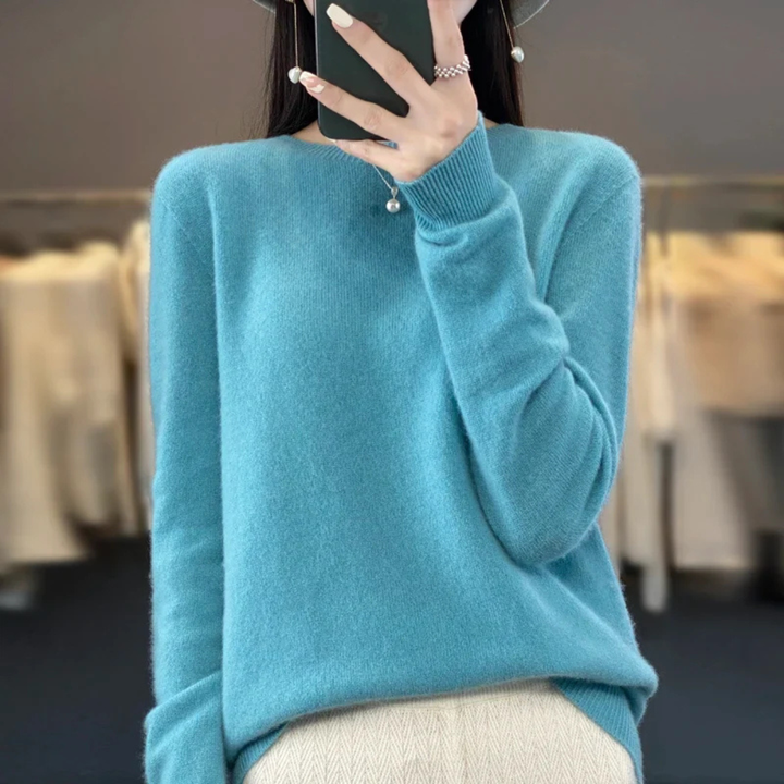 Women's warm crewneck pullover sweater in soft knit for cozy autumn & winter comfort.