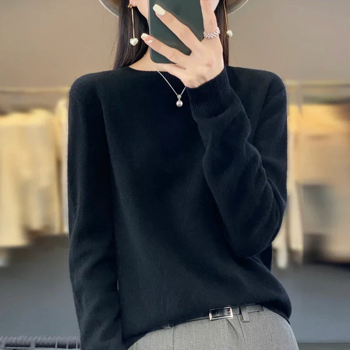 Essential warm women's crewneck pullover sweater, soft knit for cozy layering.