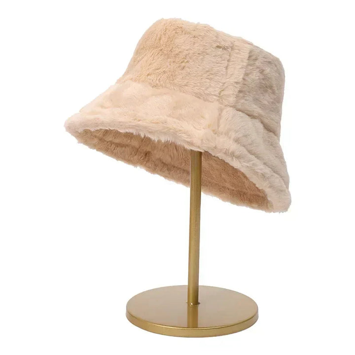 Warm women's faux fur bucket hat, ideal for autumn and winter style.