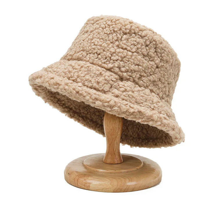 Stylish women's plush teddy bucket hat, perfect for autumn and winter fashion.