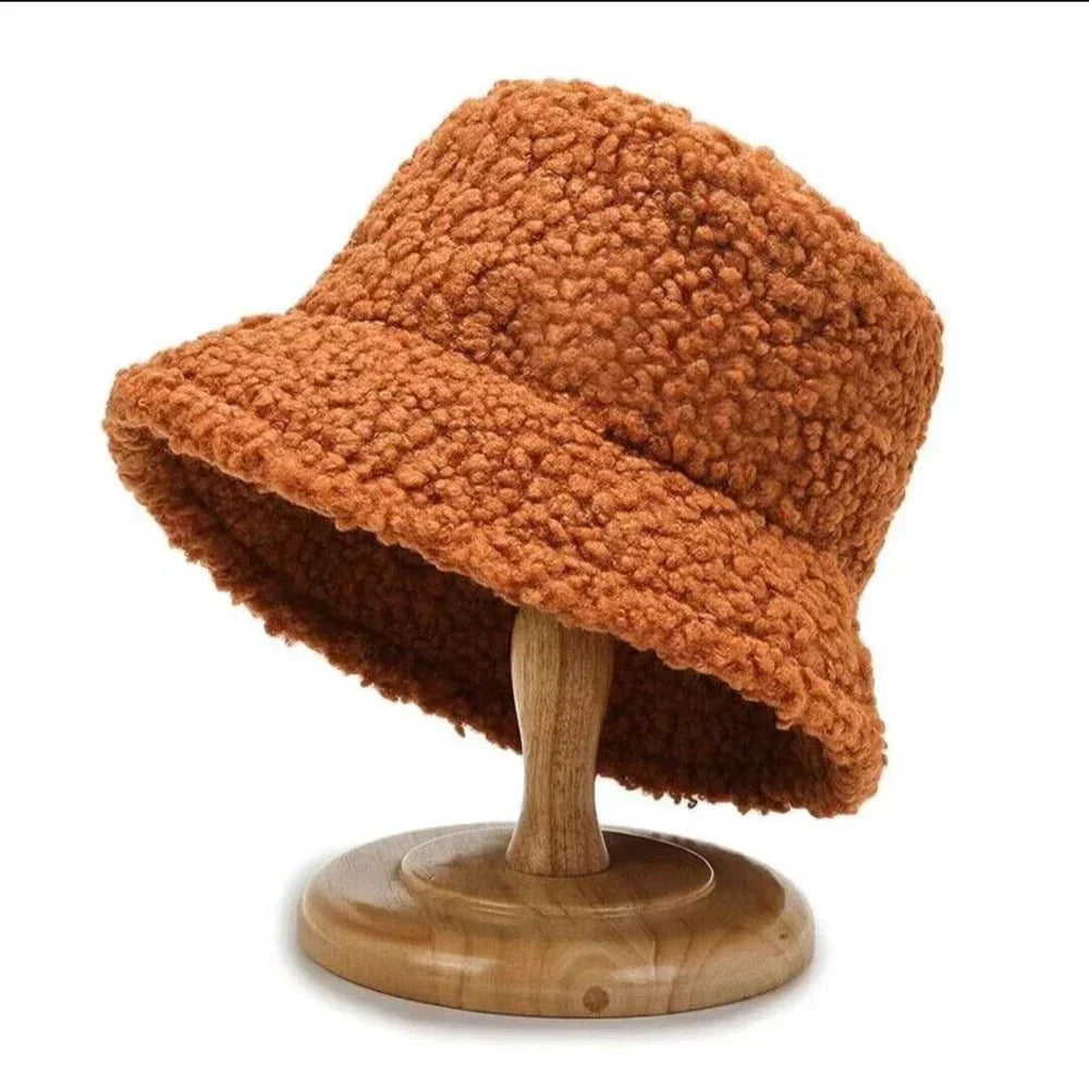 Fashionable Livia teddy bucket hat for women, a warm and cozy headwear accessory.