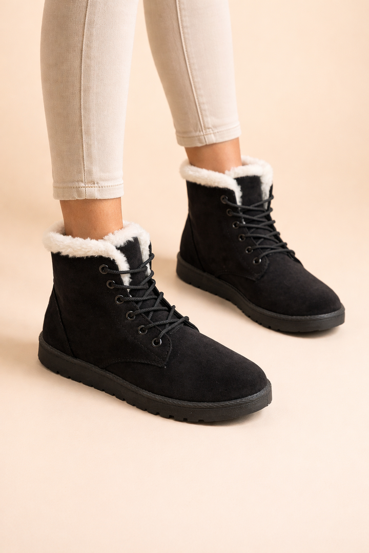 Close-up of cozy women's winter boots with soft lining, ensuring warmth and comfort in cold weather.