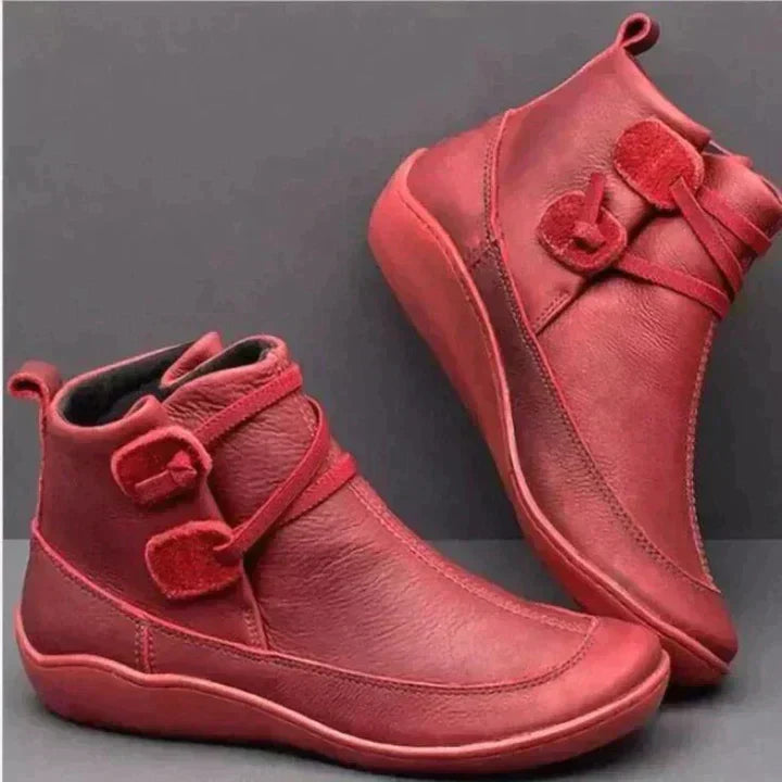 Stylish women's black waterproof ankle boots with cushioned sole, ideal for rain and snow