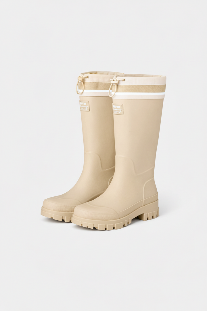 Women's waterproof rain boots, durable slip-on design for wet weather & outdoor gardening.