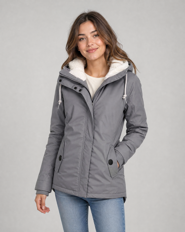 Plus size women's waterproof rain jacket with hood, protective and stylish outerwear.
