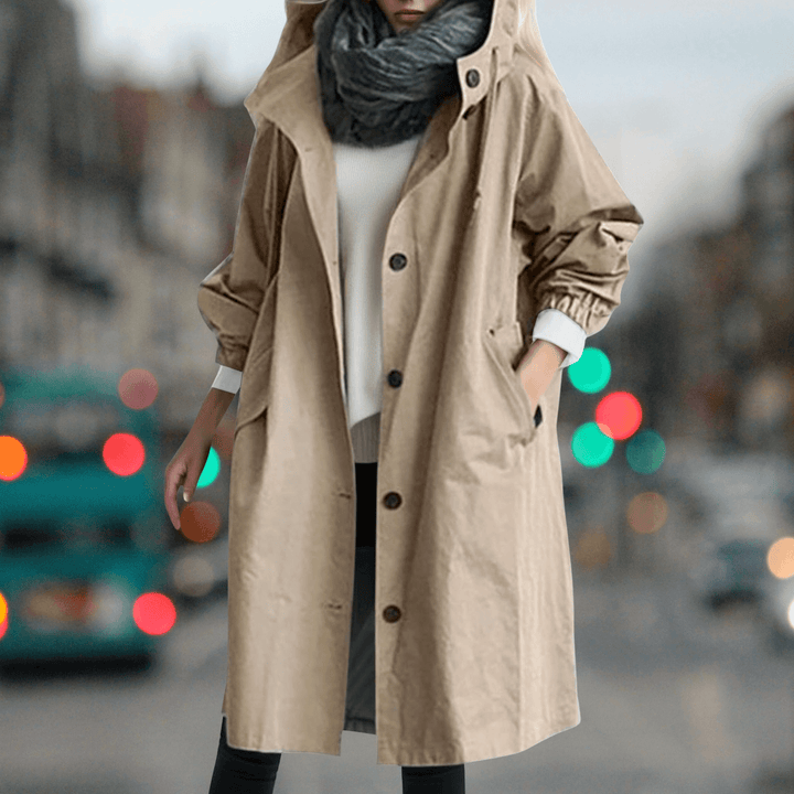 Women's waterproof teddy lined trench coat, a warm and stylish jacket for fall and winter weather.